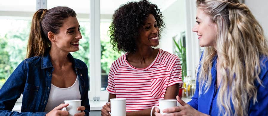 women in recovery having coffee