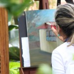 woman paints to reduce her anxiety