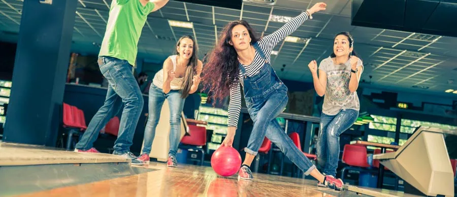 friends playing bowling