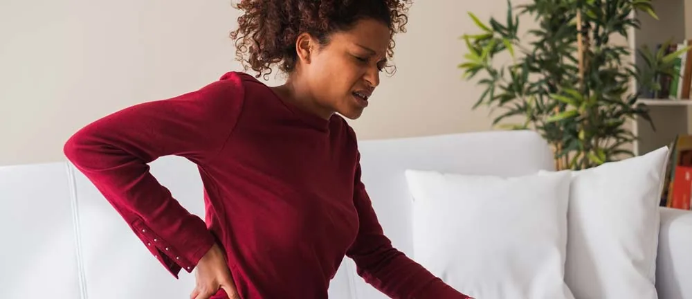 woman suffering from chronic back pain