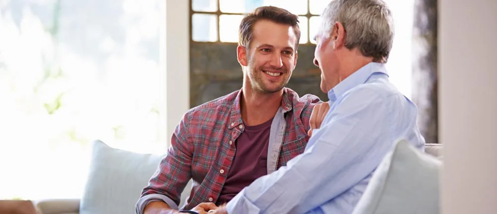 father visiting son in sober living