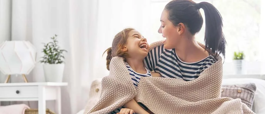 mom playing with her daughter