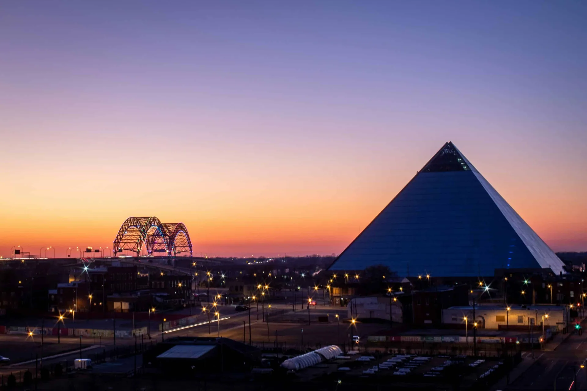 Memphis Pyramid and bridge at sunset symbolizing growth and transformation in sober living.