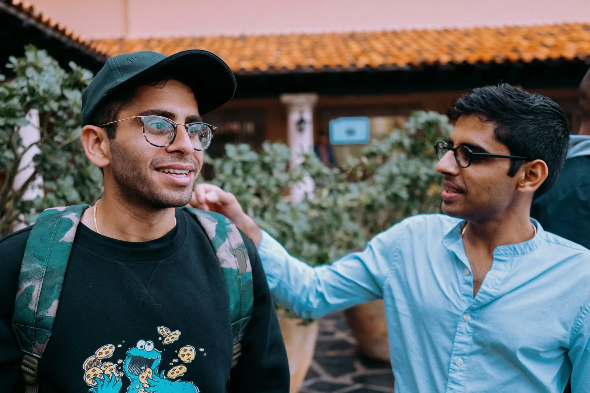 Peer support and encouragement in a structured sober living program.