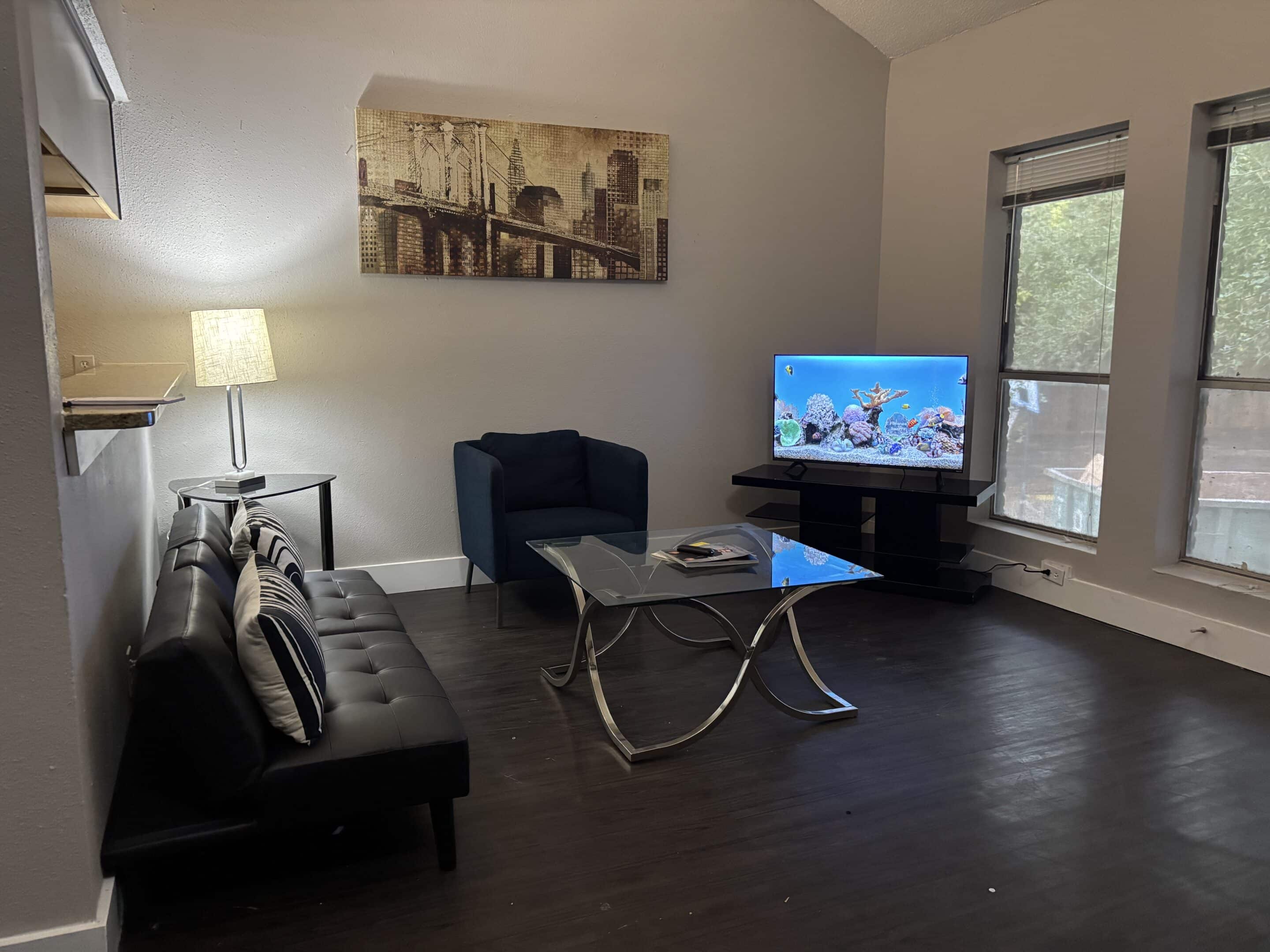 Affordable two-bedroom men’s sober apartment in Austin with modern furniture and natural light