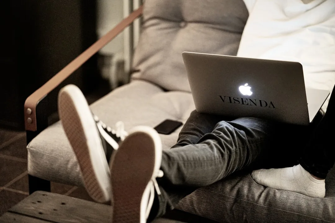 Person attending virtual therapy session at home - Photo by Jonas Allert on Unsplash