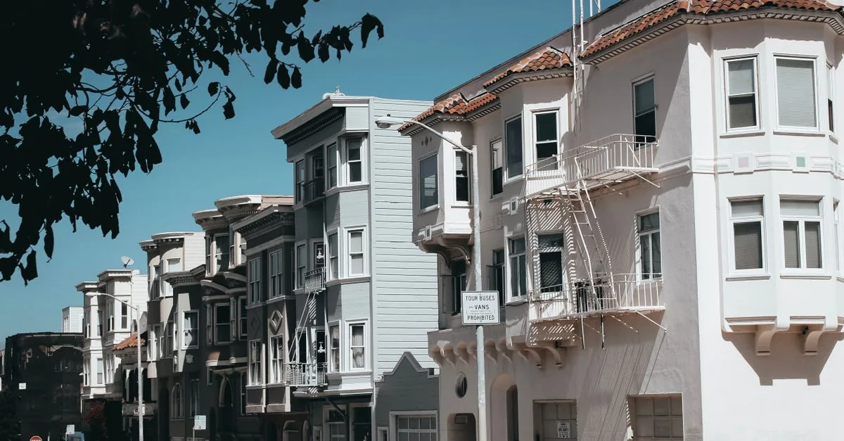 A tranquil street view showcasing classic San Francisco architecture with charming homes and calm urban vibes.