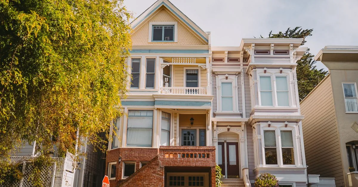 Front view of a charming Victorian townhouse capturing classic architecture and urban aesthetics.