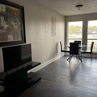Affordable bunk-style men’s sober living in Austin with twin beds and open layout