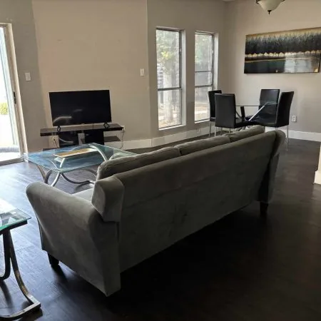 Budget men’s sober housing with two bunk sets and natural light in Austin
